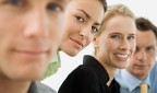 Portrait of four office workers
